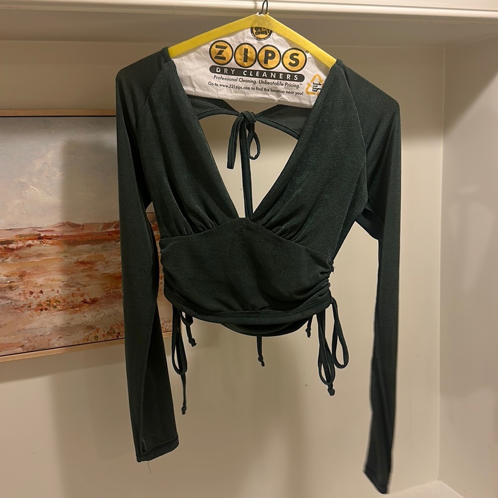 12th tribe , green open back top. Size medium